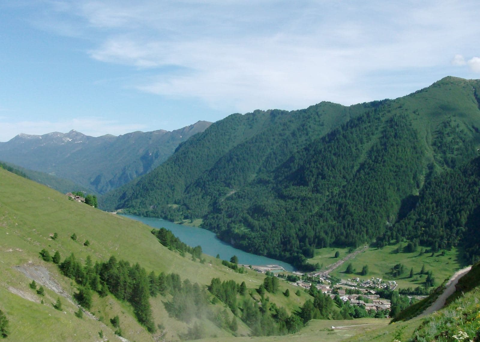 The turquoise reservoir of Lac de Pontechianale beside Chianale